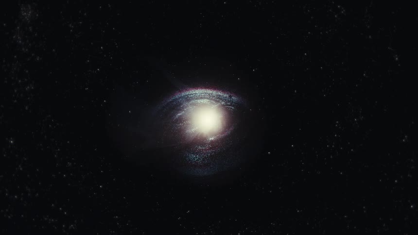 A mesmerizing animated shot revealing a distant, rotating galaxy in the dark expanse of the cosmos