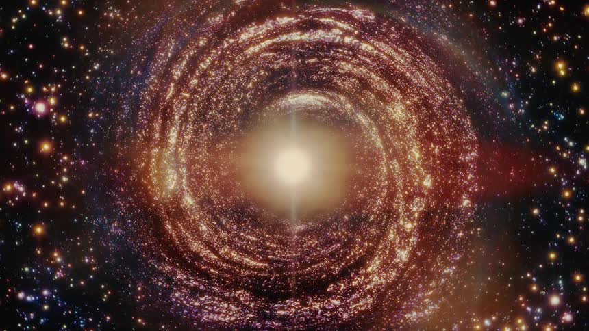 A stunning animation of a spiral galaxy rotating slowly around a bright, central light in deep space