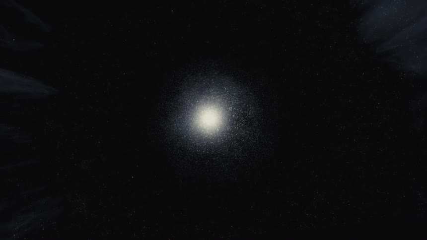 A bright, distant galaxy drifts in the vast, empty darkness of outer space