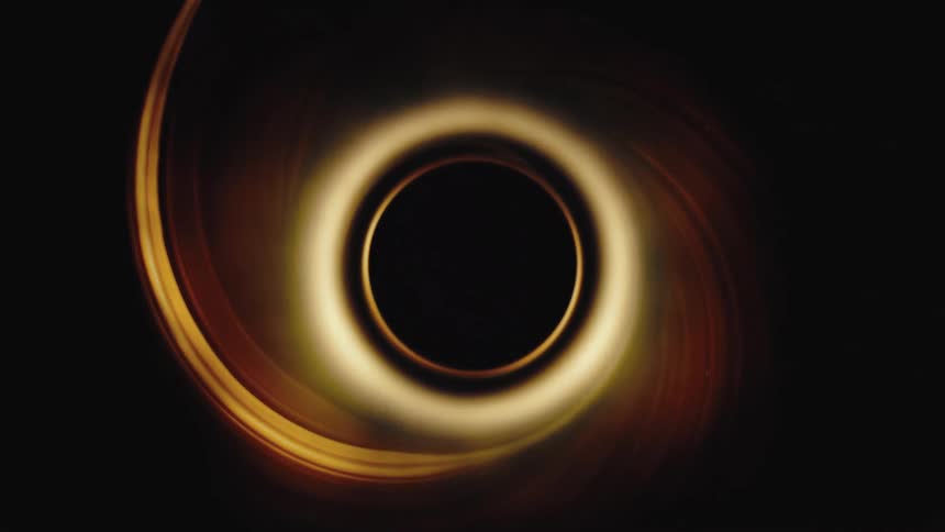 A realistic CGI animation depicts a supermassive black hole with a glowing accretion disk swirling in the darkness of deep space
