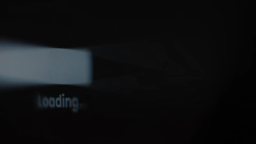 A macro shot shows a progress bar filling up next to the word 'loading' on a dark screen