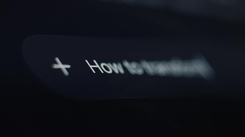 A macro view shows the words 'How to transform' being typed into a new browser tab on a dark computer screen