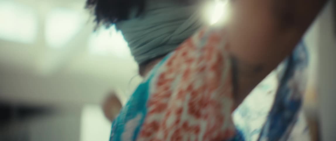 Close up slow motion shot of an affectionate young couple dancing happily and intimately together in their home