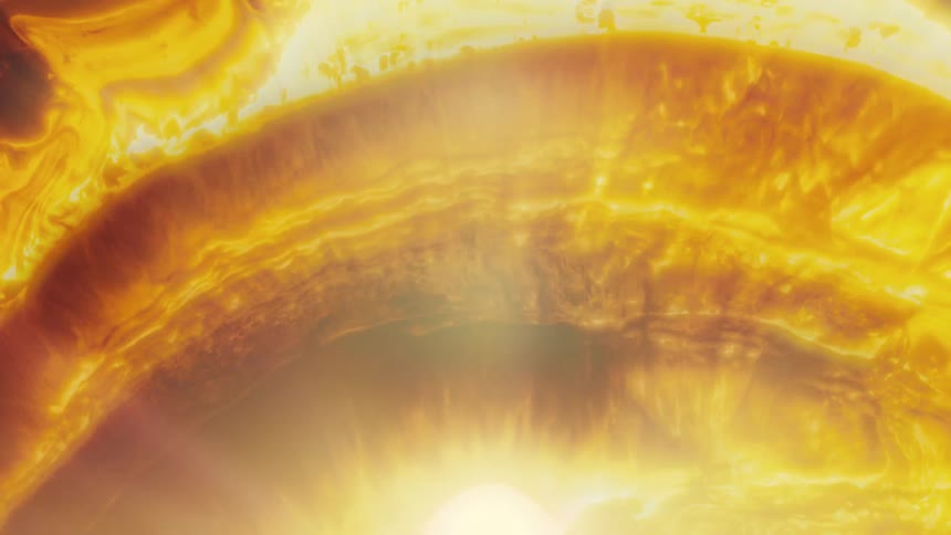 An abstract macro shot captures glowing golden and fiery liquids swirling, resembling a powerful solar flare or the surface of the sun