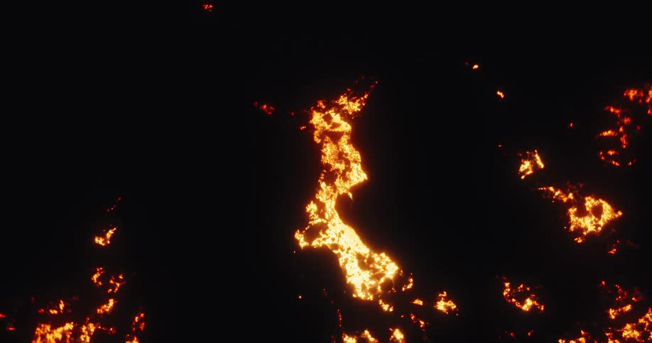 A mesmerizing abstract visual of fiery golden material slowly spreading and connecting across a dark background