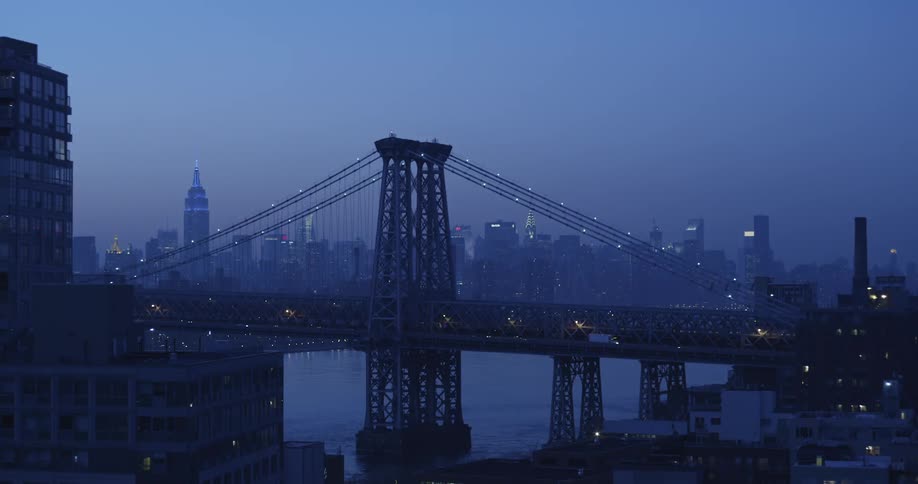 View of a city bridge at sunset