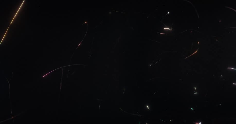 A dynamic animation of colorful, glowing light streaks flowing and dancing on a black background