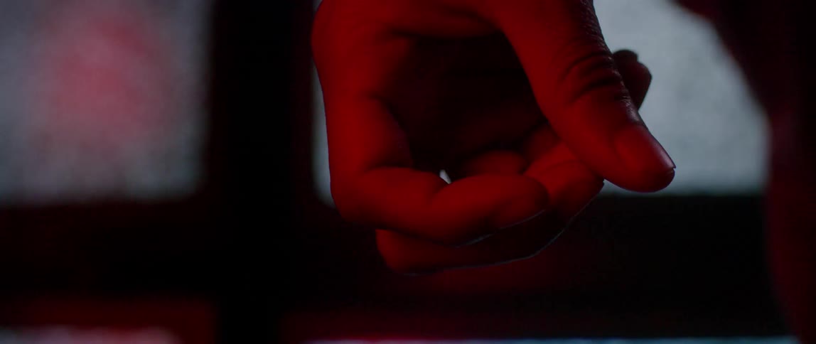 Persons hand curls