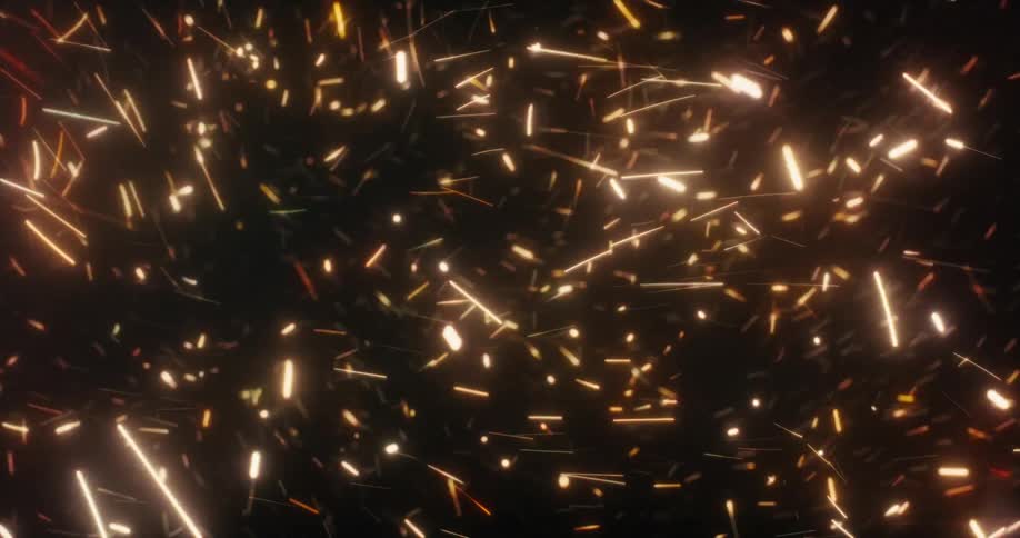 A chaotic storm of glowing golden sparks and fiery light trails swirls energetically against a dark background