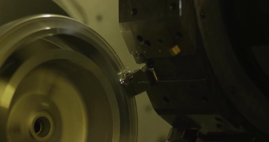 A machine is spinning turning a wheel