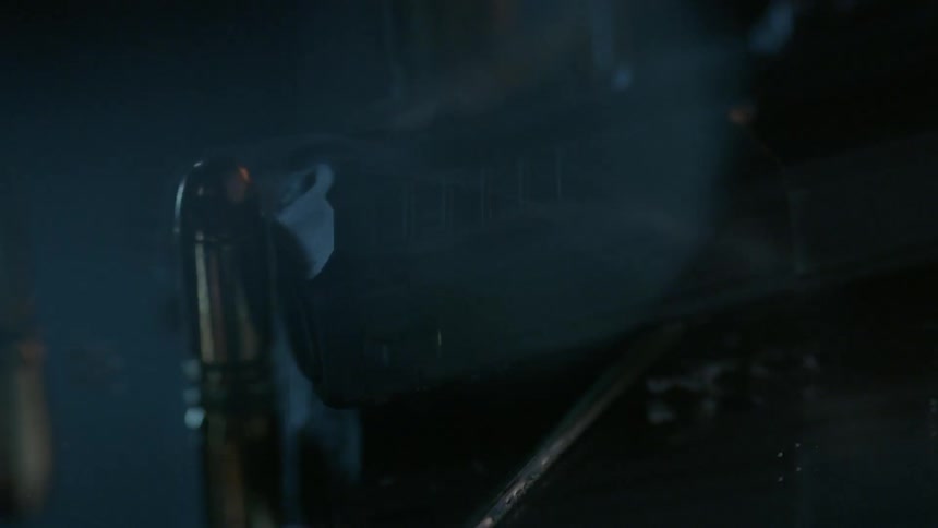 Smoke billows out of gun