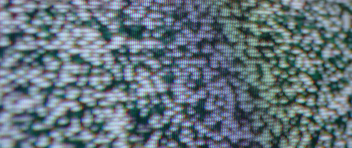 A television screen is flickering static