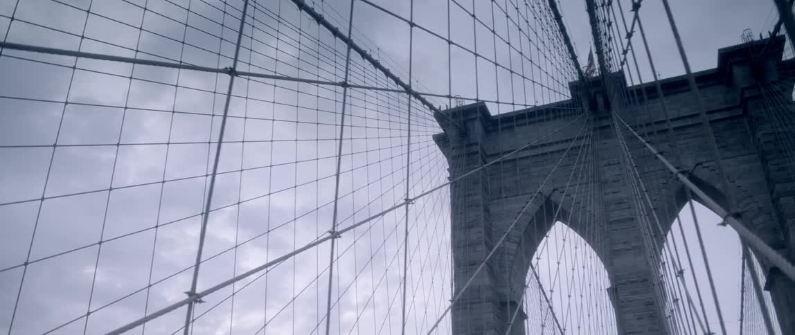 View of wires and beams of a bridge
