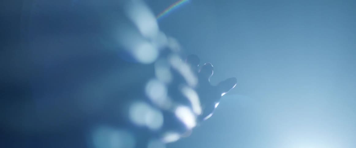 Light shining off of a hand