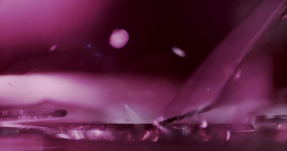 The glass breaks and jumps everywhere