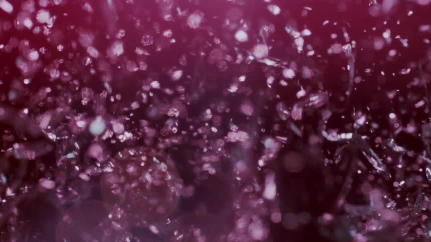 Glass falls and shatters everywhere