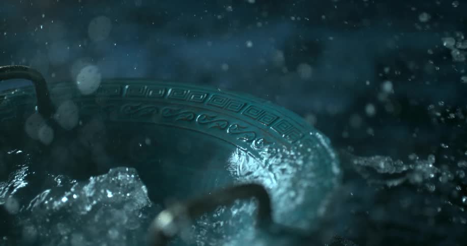 Water splashing out of a bowl