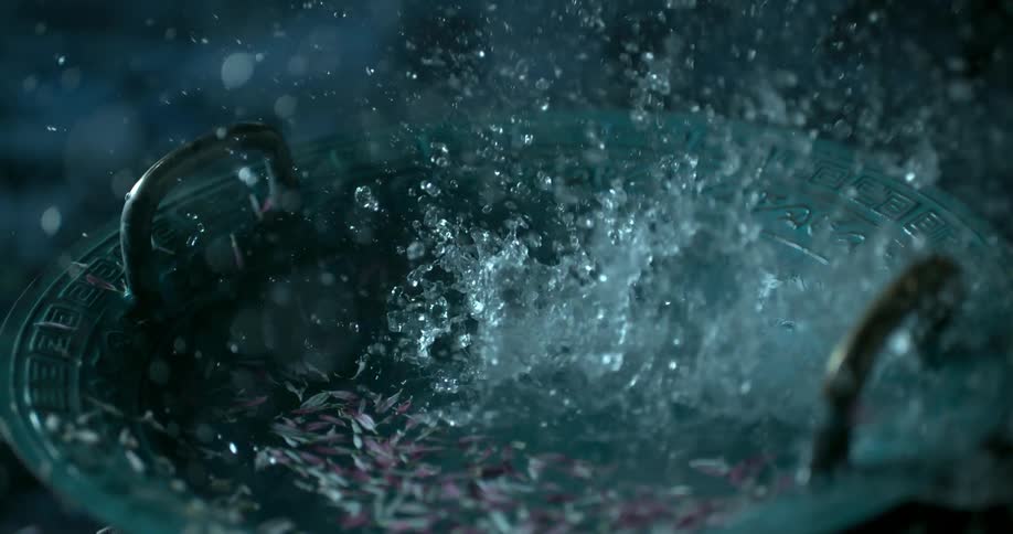 Water is exploding up and out of a basin
