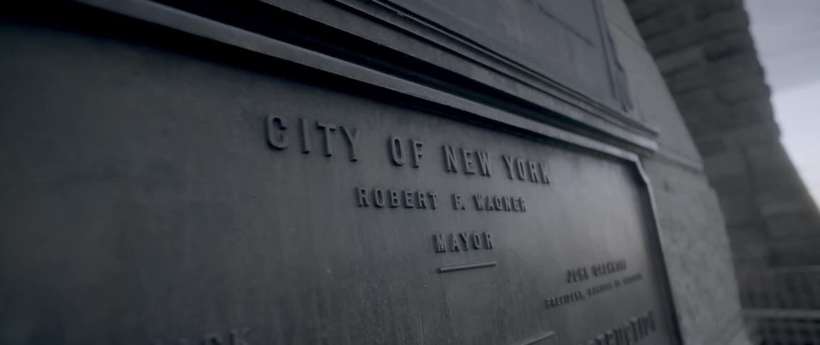 A plaque outside reads city of new york