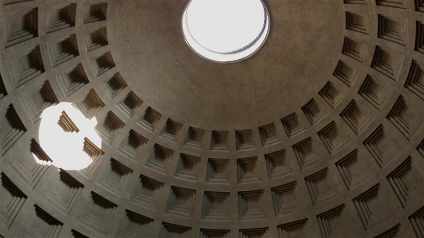 The domed building has a single circular window at the top