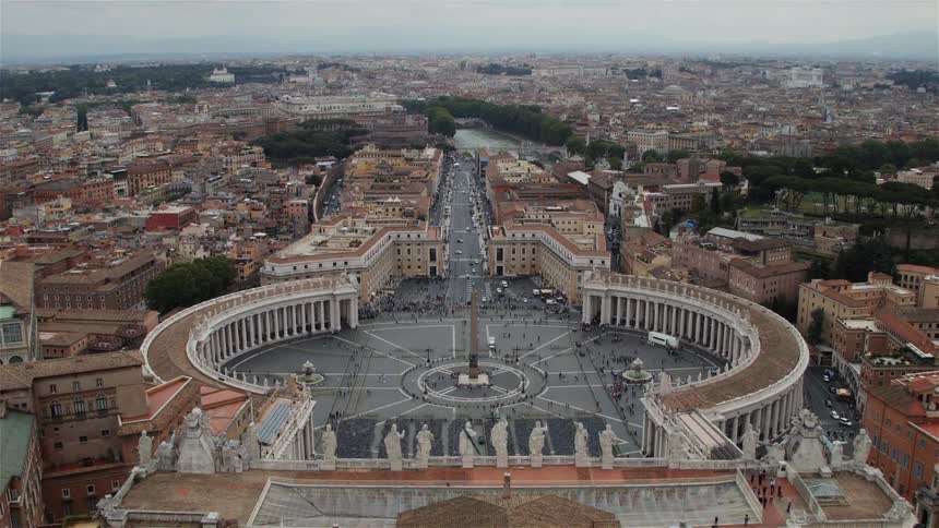 The square below is lined with statues