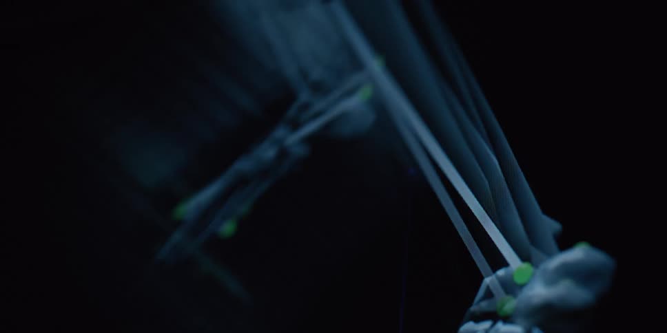 A close-up of a futuristic 3D animation displaying the biomechanics of an animal's skeletal leg and paw with motion capture data points