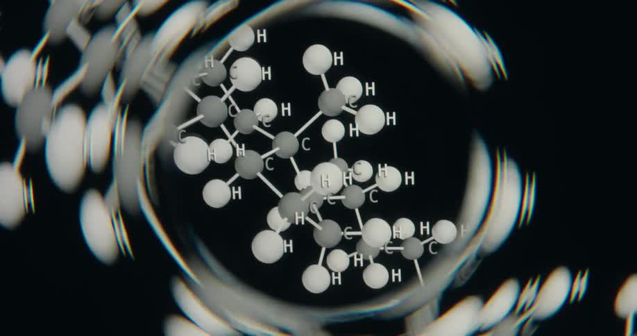 A 3D animation of a hydrocarbon molecule viewed through a distorted lens, slowly zooming in against a black background
