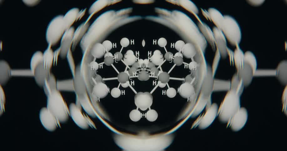 An abstract, symmetrical, and kaleidoscopic animation of a rotating chemical molecule structure on a black background