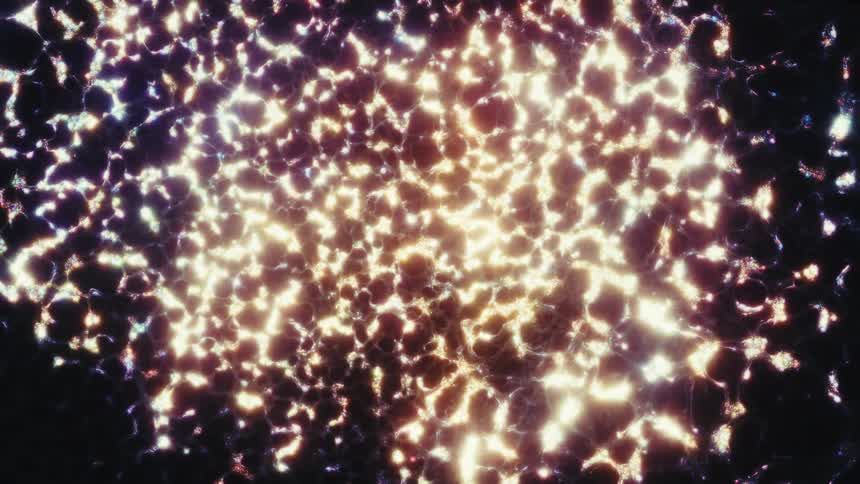 Abstract golden and purple light forms a shimmering, web-like pattern