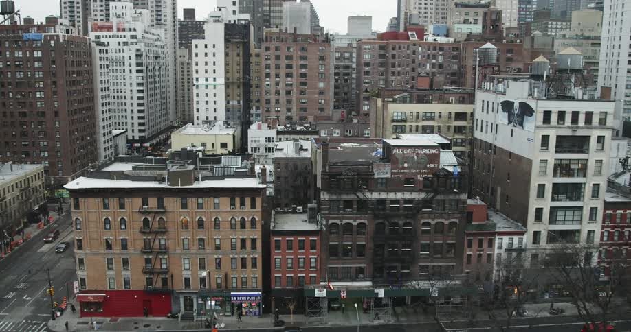 Aerial view of busy city streets and buildings