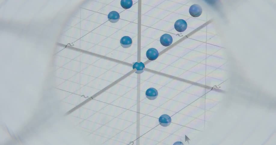 A macro shot through a magnifying glass reveals a rotating 3D graph with animated blue data points on a digital screen