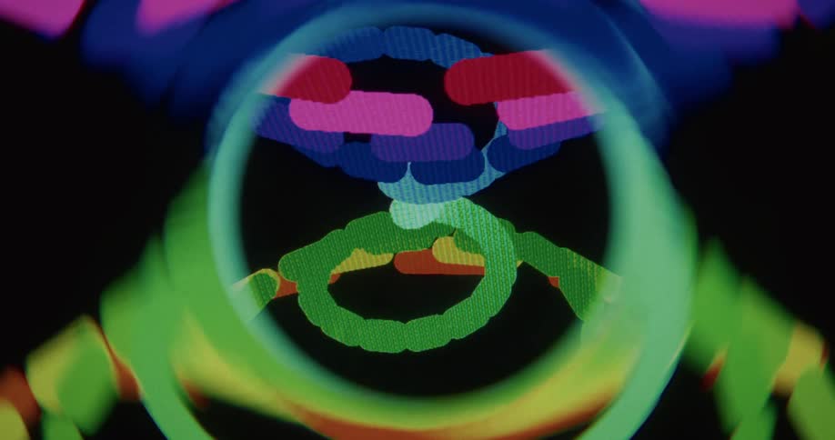 Hypnotic, abstract digital animation of colorful, swirling shapes creating a kaleidoscopic effect on a screen