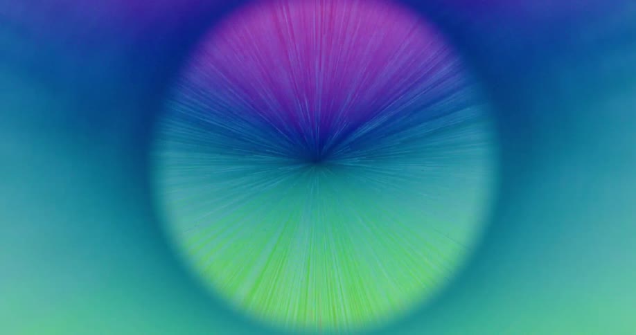 A mesmerizing digital animation of a colorful sphere radiating light beams that slowly change from cool to warm tones