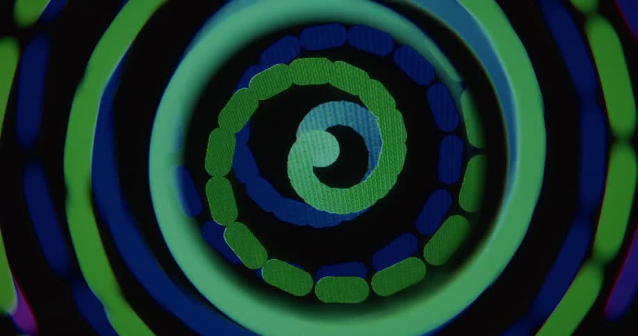 Abstract, colorful, spiraling patterns animate in a hypnotic, psychedelic loop