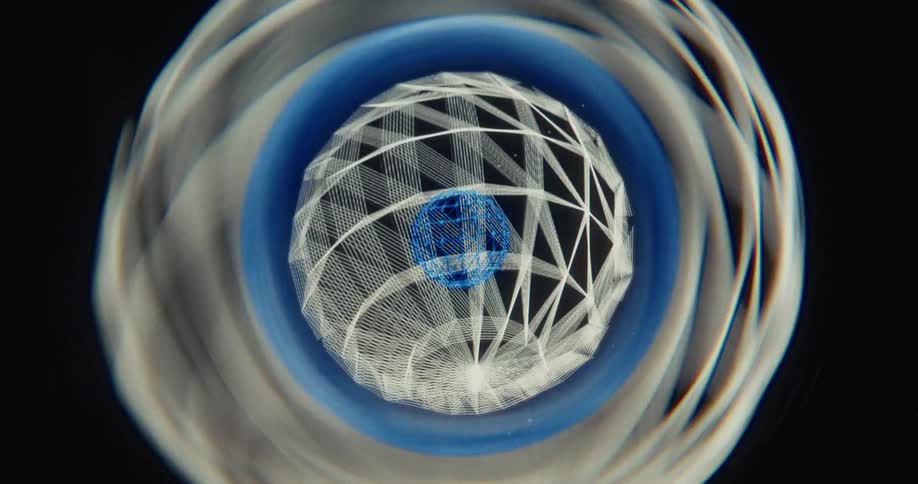 Complex geometric shapes and lines form rotating spheres in a mesmerizing digital display