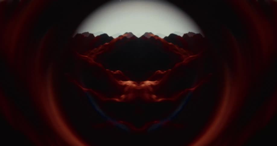 Dark, moody, and symmetrical abstract visuals create a hypnotic and mysterious Rorschach effect