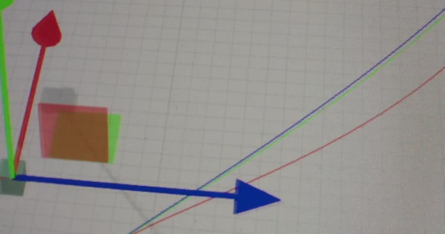 Close-up of a computer cursor manipulating colorful lines and shapes in a 3D modeling program