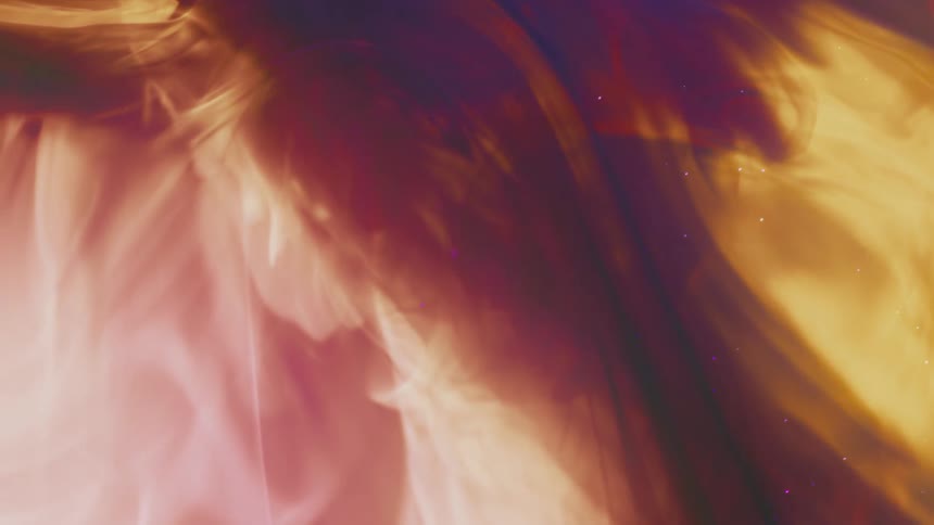 Vibrant yellow and deep pink ink swirl gracefully, creating a warm and ethereal abstract background