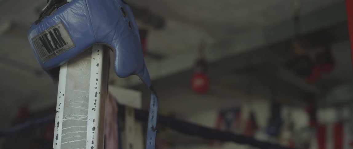 Boxing glove hanging on a pole