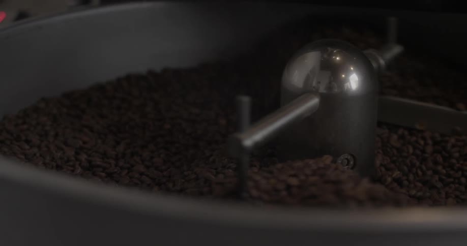A coffee roaster rotates