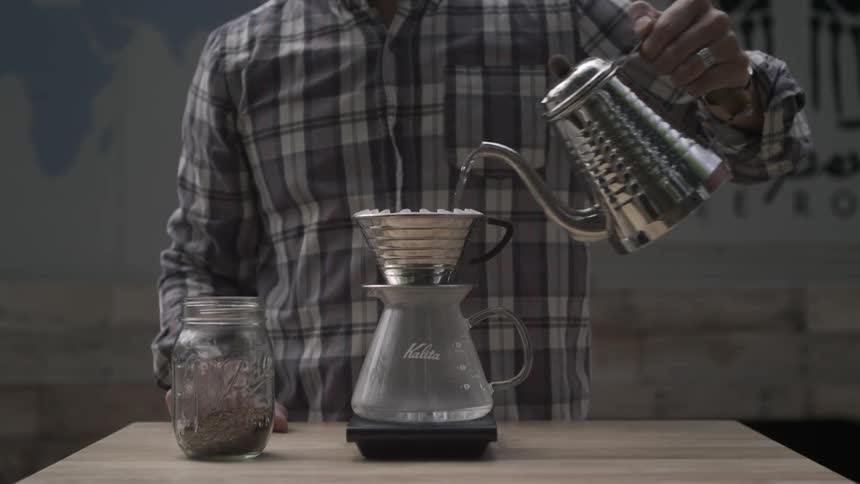 Hot water is poured into a coffee filter
