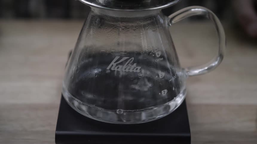 A coffee pot slowly drips water inside