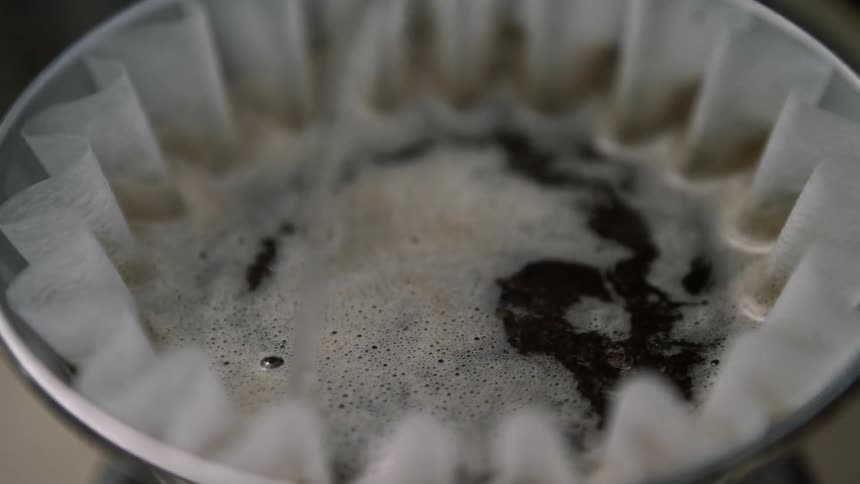 Hot water is poured into a coffee filter