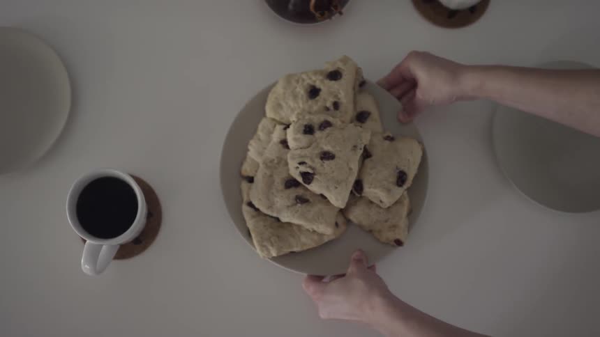 Baked goods are set on a white table cloth