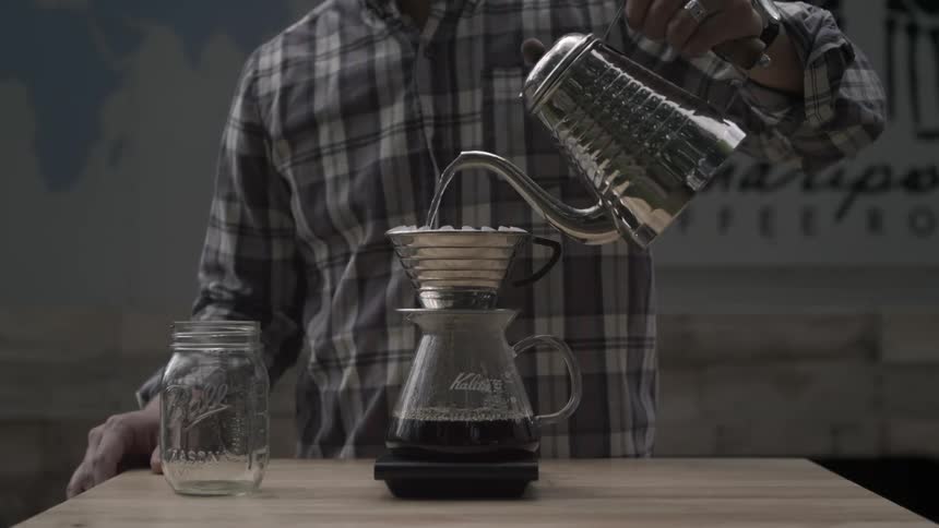 Hot water is poured into a coffee filter