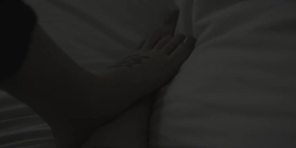 A person is stepping on a pillow
