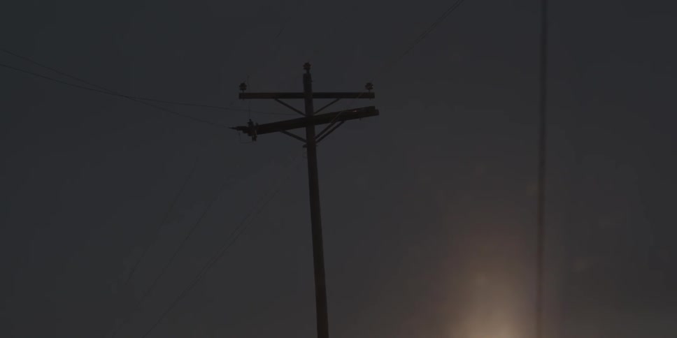 Phone poles at night