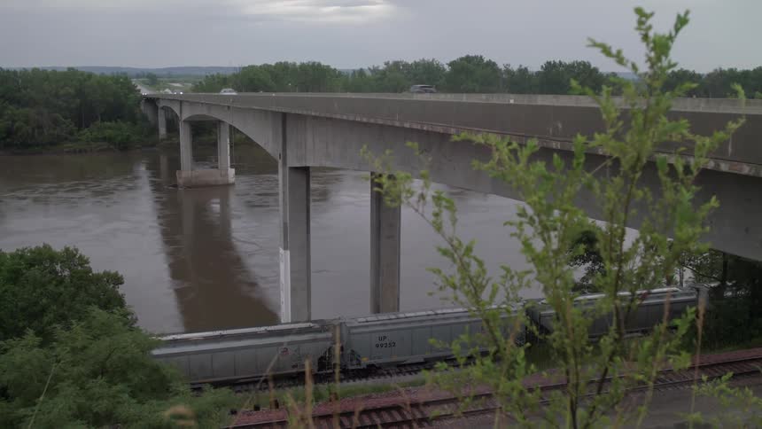 Cars travel over this small bridge