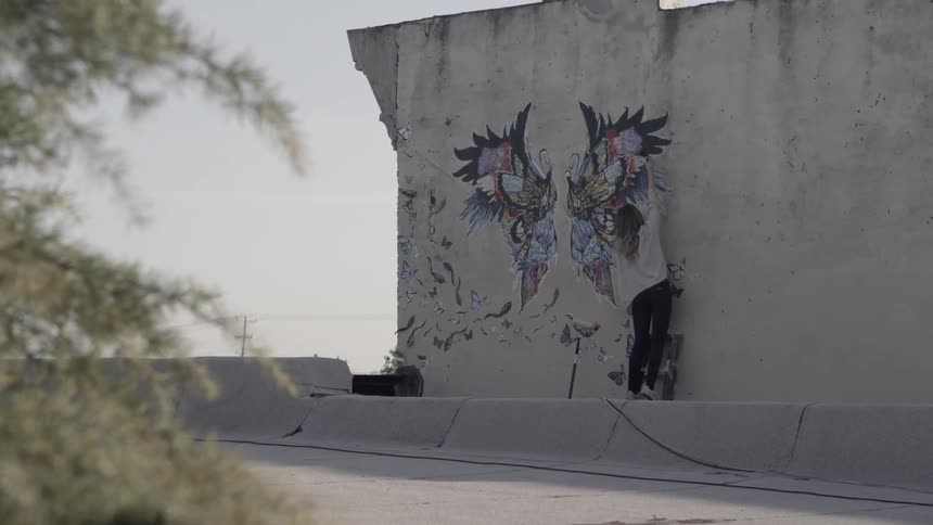 View of graffiti on a wall on a sunny day