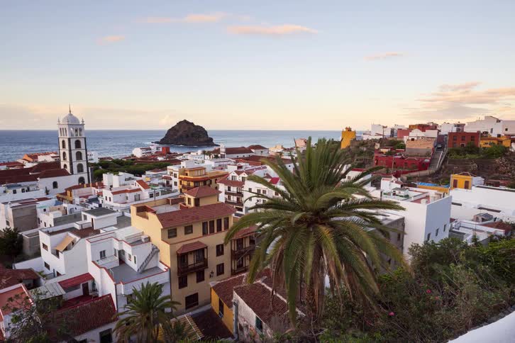 A beautiful timelapse captures the seaside town of Garachico in Tenerife, Spain, with its classic architecture and offshore island at sunset